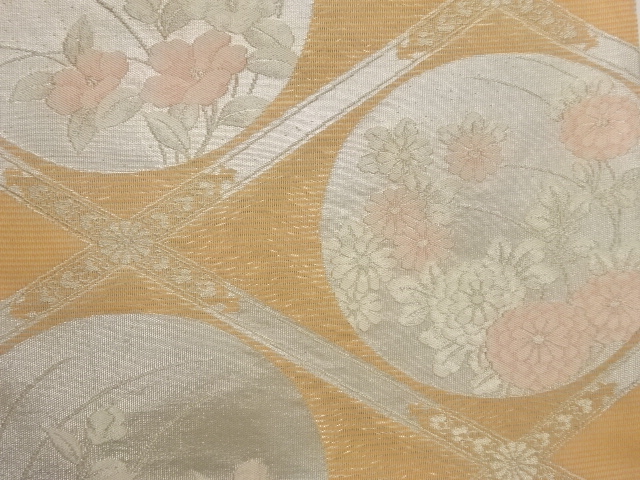  襷に花丸模様織出し袋帯